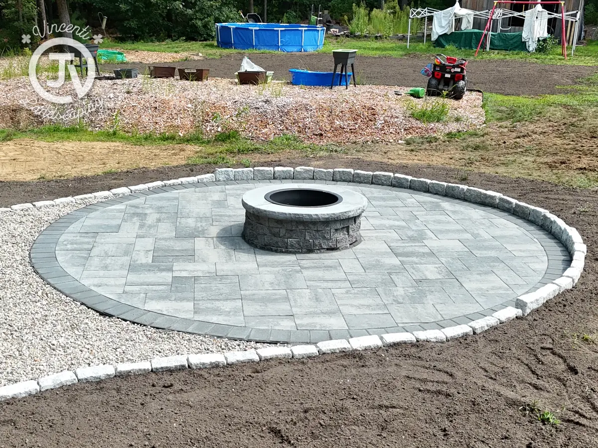 Fire pit patio installation in Kingston, MA by Vincenti Landscaping