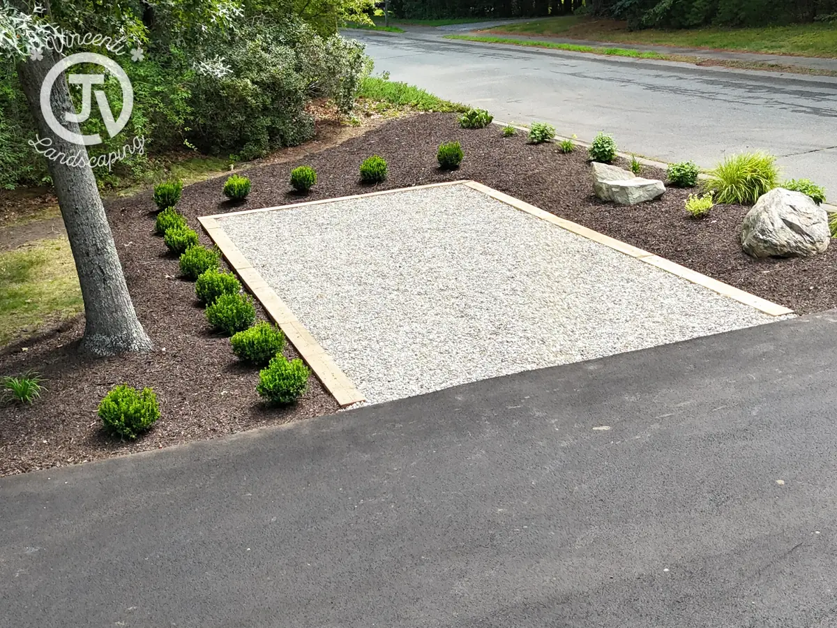 Gravel parking pad installation in Kingston, MA by Vincenti Landscaping