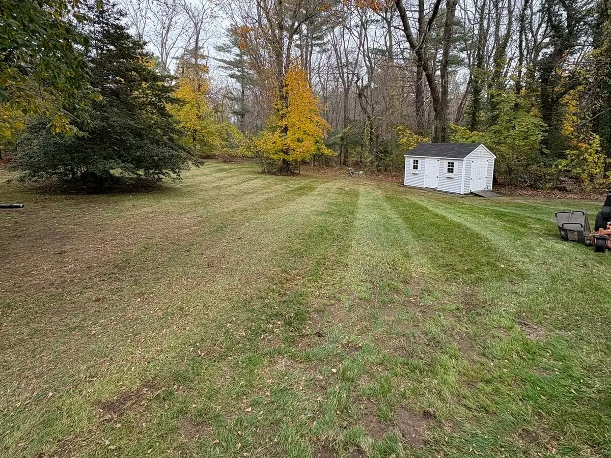Backyard after fall cleanup by Vincenti Landscaping
