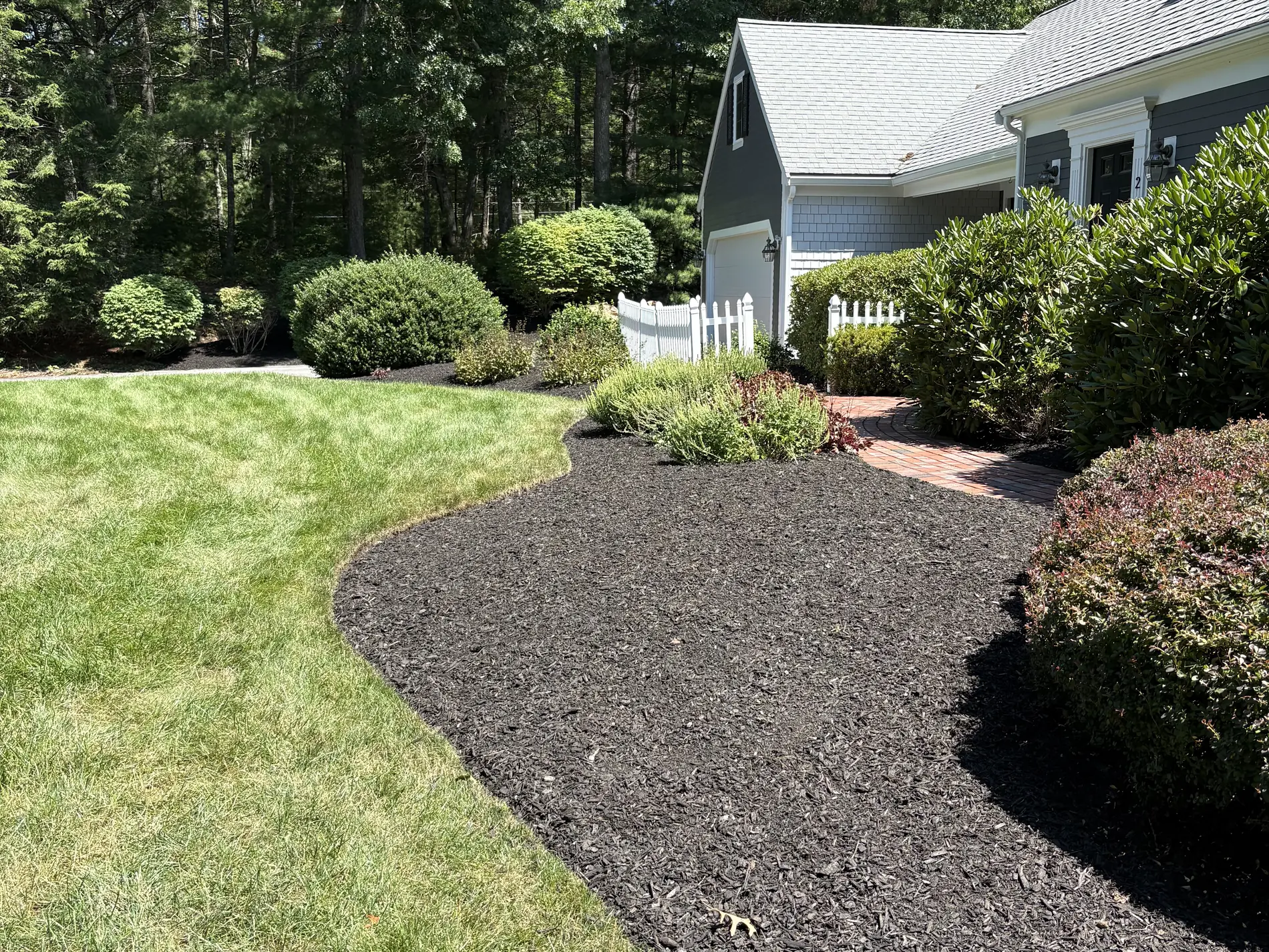 Fresh mulch beds by Vincenti Landscaping