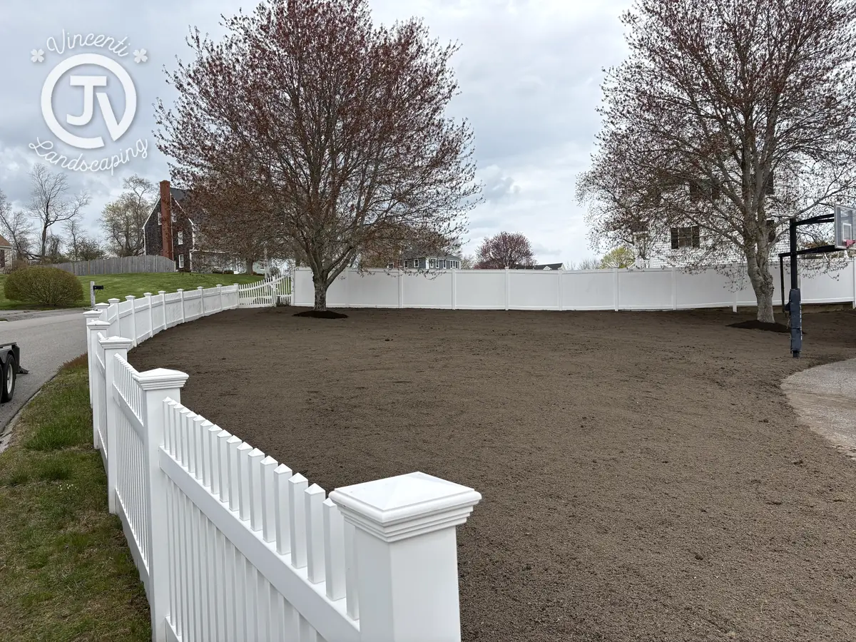 Lawn regraded and seeded for new turf by Vincenti Landscaping